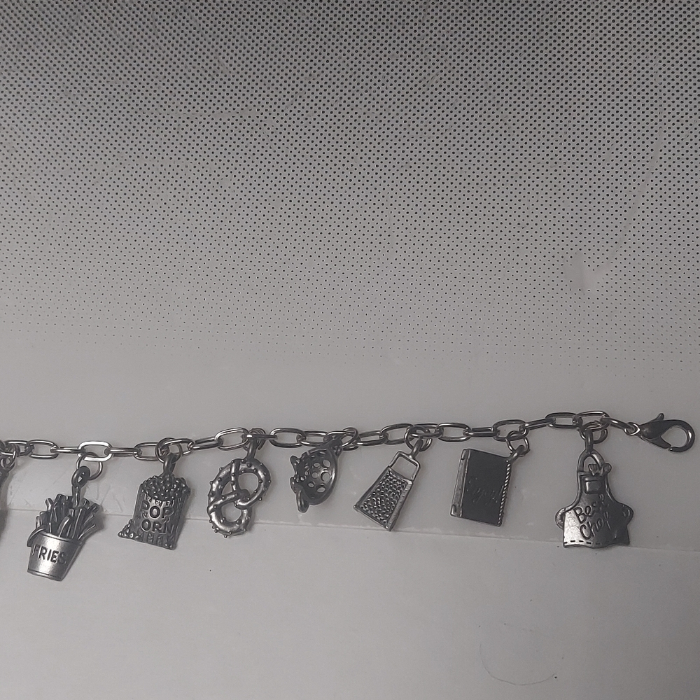 Silver 11 Charms Of Golf Bracelet